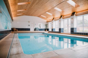 Vast, Elegant Home with Indoor Pool & Sauna near Popular Golf Course